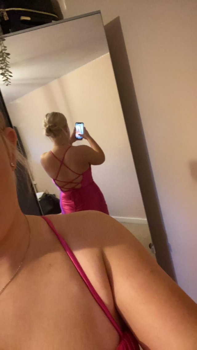 Preview of the first image of Stacees pink prom dress.
