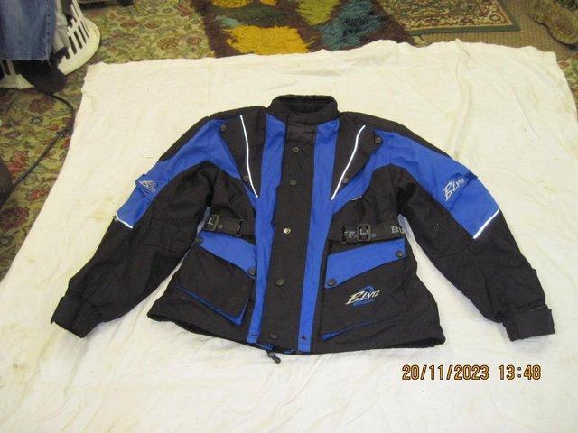 Preview of the first image of mens buffalo textile jacket size medium.
