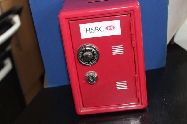 Preview of the first image of HSBC safe style money box, with key , and draw . . . . . . ..
