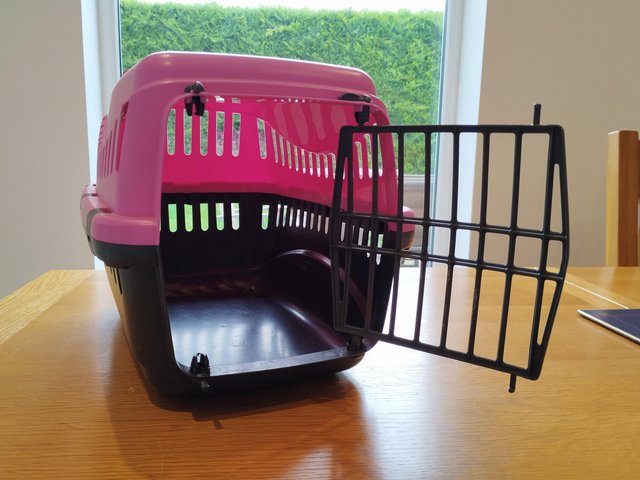 Preview of the first image of Pink and grey small pet carrier.