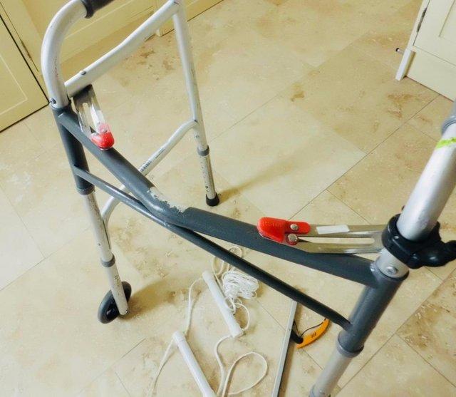 Preview of the first image of STURDY LIGHTWEIGHT FOLDING WALKER.
