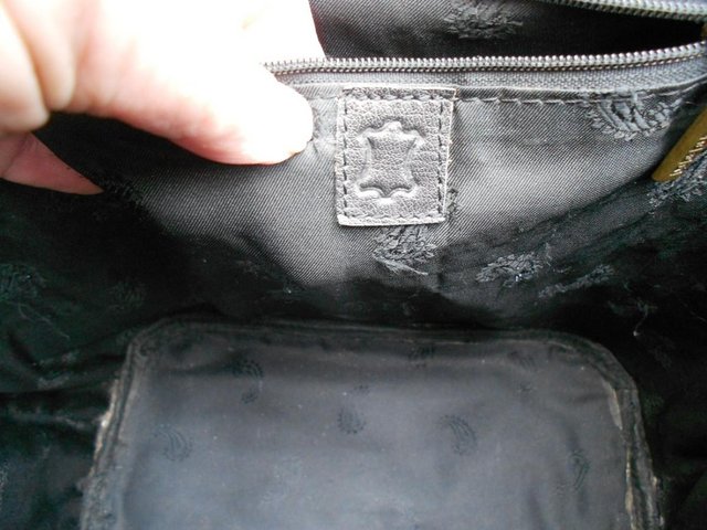 Preview of the first image of Leather Bucket shaped handbag.