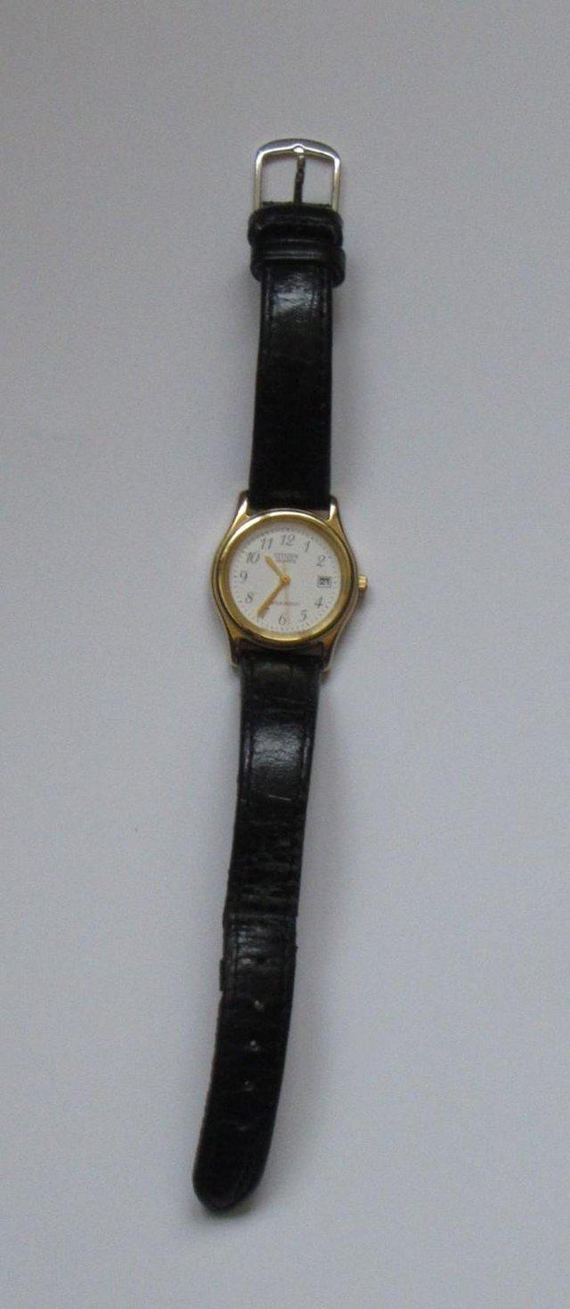 Preview of the first image of Citizen women’s wristwatch with black leather strap.