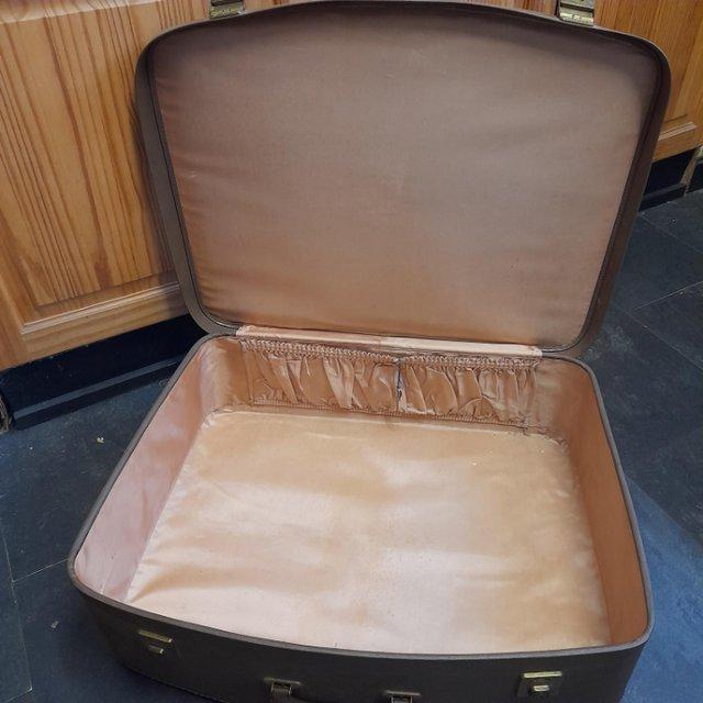 Preview of the first image of 1950s vintage brown suitcase,v good condition..