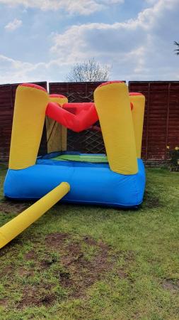 Image 1 of Bouncy castle and pump in full working order