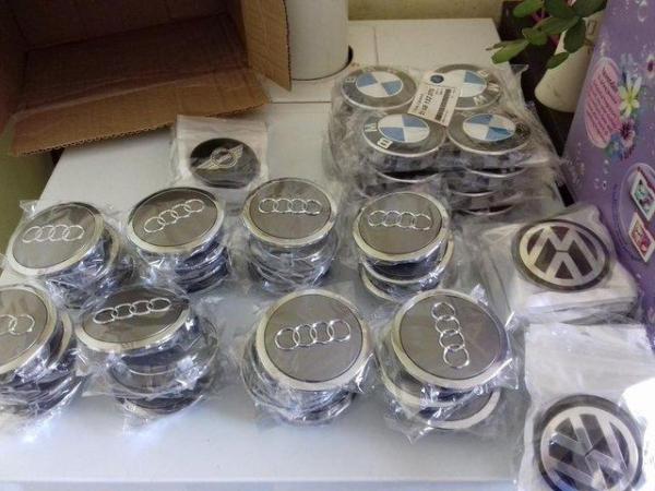 Image 1 of Alloy wheel centre caps and badges to repair centre caps.