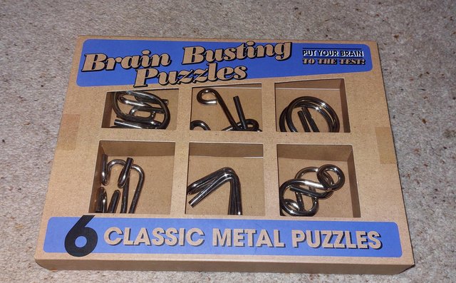 Image 1 of Brain Busting metal puzzles, brand new