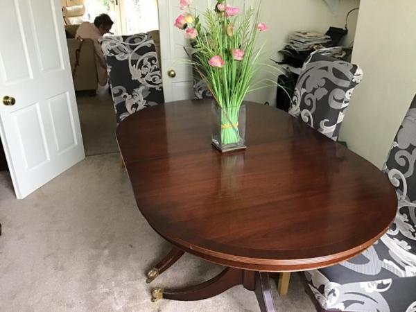 Image 1 of Dining table with 6 chairs. Also with matching sideboard.