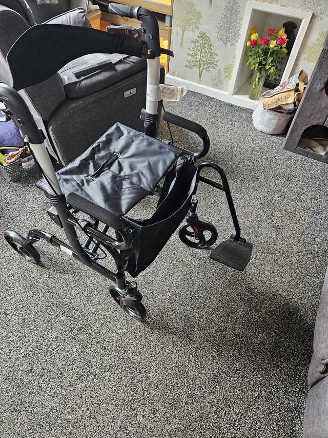 Preview of the first image of Walker/wheelchair as new.