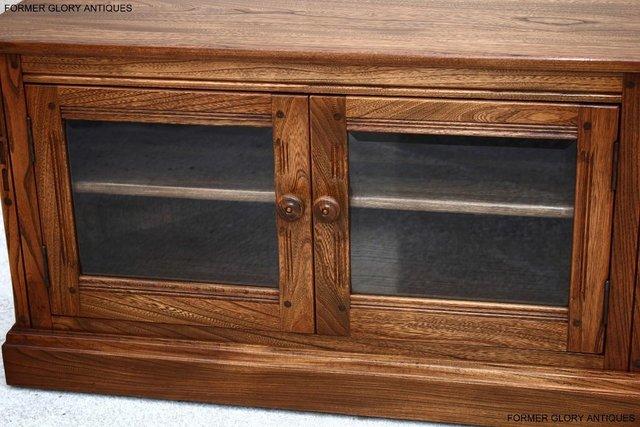 Image 60 of AN ERCOL GOLDEN DAWN ELM CORNER TV CABINET STAND TABLE UNIT