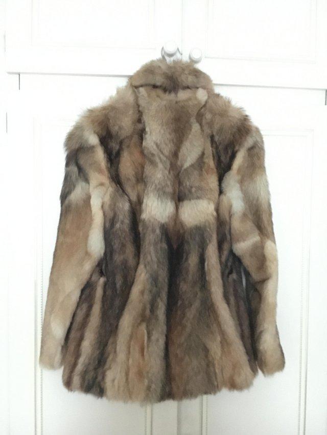 Preview of the first image of Genuine ladies fur coat for sale.