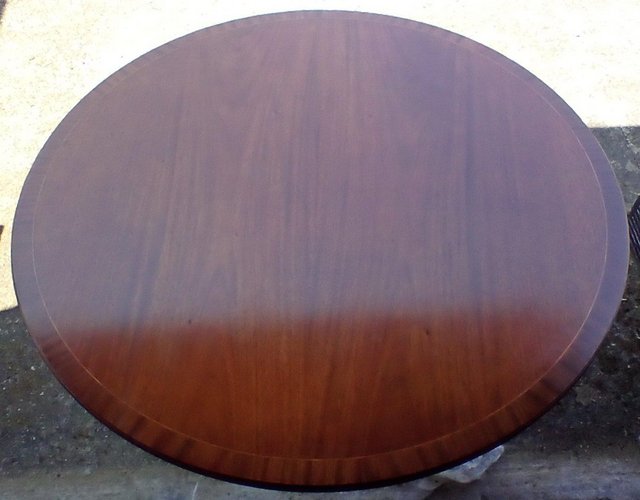Preview of the first image of Mahogany Dining Table sits 5 people.