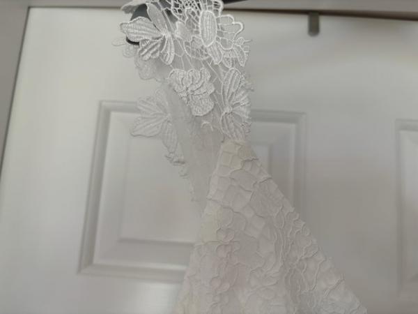 Image 1 of Modern wedding dress- size 14 BNWT