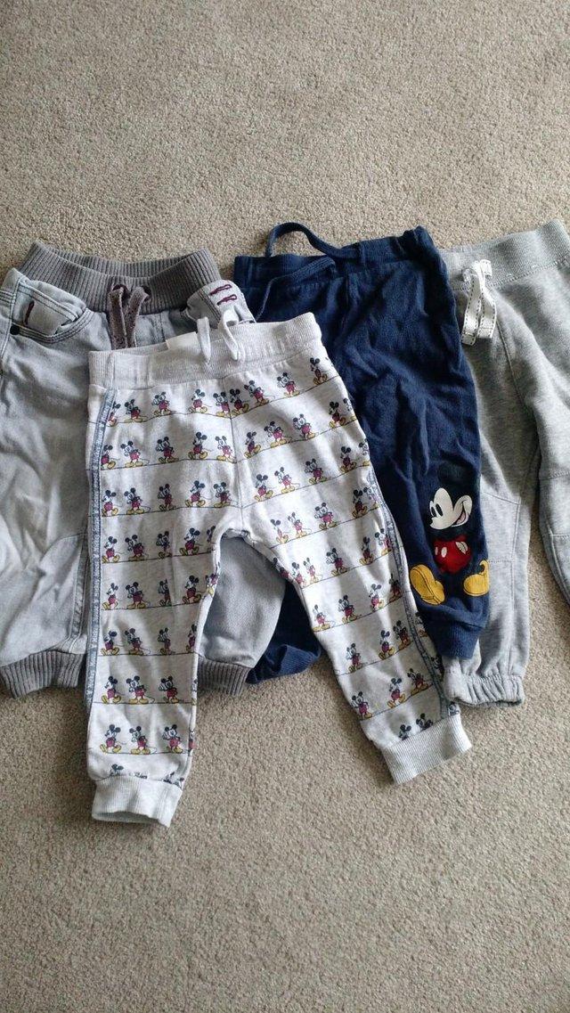 Preview of the first image of Boys 4 pairs of trousers 18-24 months.