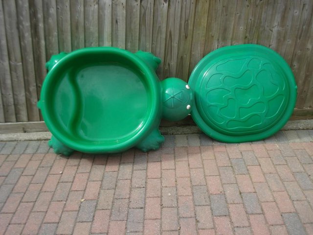 Preview of the first image of Childs paddling pool/sand pit.