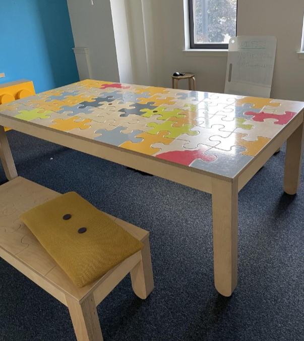 Preview of the first image of Large Multi-coloured Jigsaw embossed/patterned meeting table.