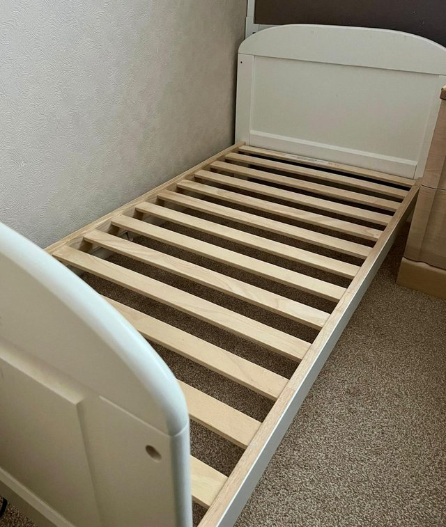 Preview of the first image of REVISED AD White cot that converts to bed..