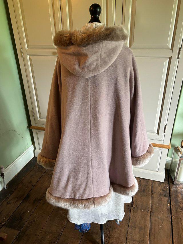 Preview of the first image of Jacques Vert dusty pink faux fur trim cashmere.