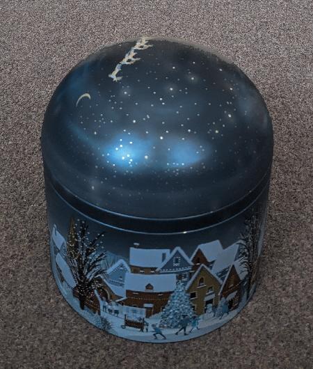 Preview of the first image of M&S Festive Musical Light Up Biscuit Tin.