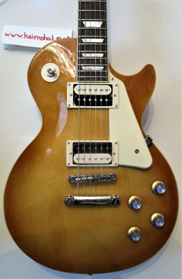 Preview of the first image of EPIPHONE  Les Paul  "Classic " Honey-Burst finish.