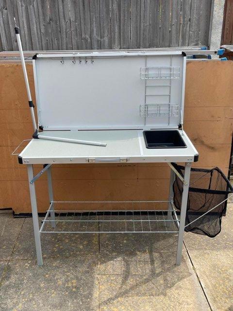Preview of the first image of Large folding kitchen table with sink.