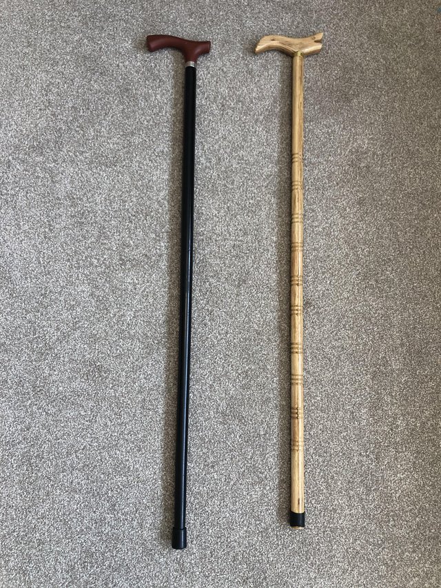 Preview of the first image of Two wooden walking sticks.