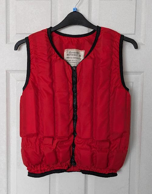 Preview of the first image of Red Adults Flotation Device/Buoyancy Aid - Size S    B29.