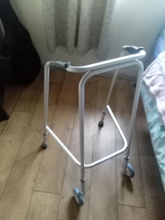Preview of the first image of Zimmer walking frame and seated four wheeled     waler..