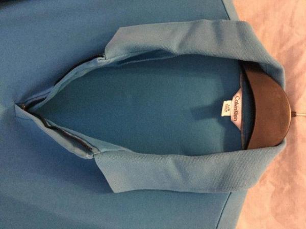 Image 2 of Blue Calvin Klein polo style shirt