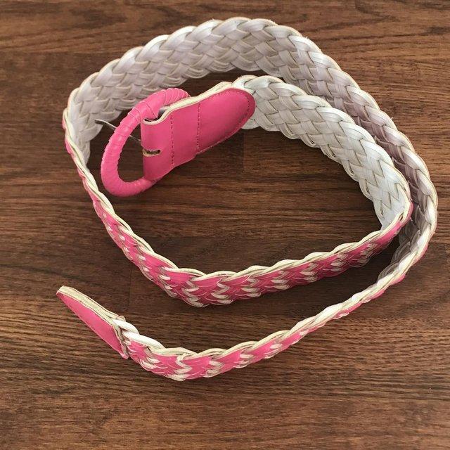 Preview of the first image of Vintage 1990's pink faux leather plaited, braided belt..