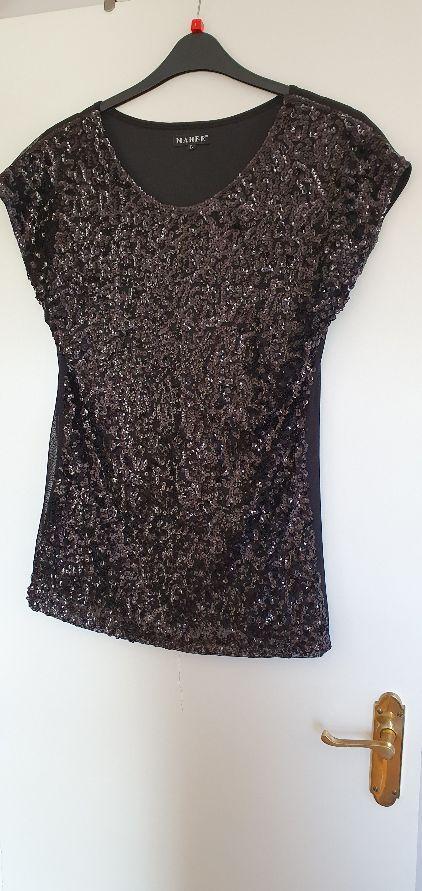Preview of the first image of Ladies sequin black sequin topcapped sleeves L / 14-16.