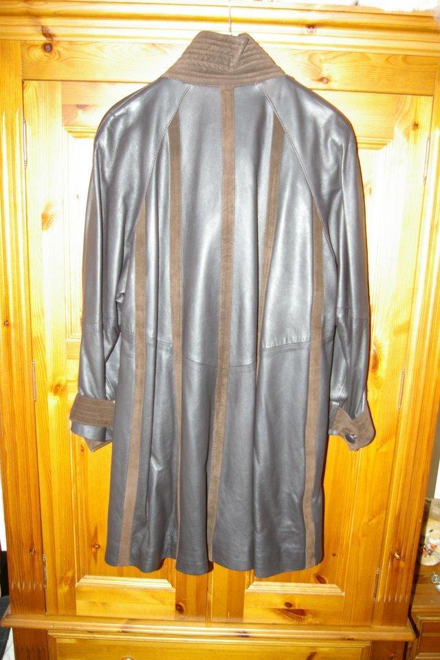 Preview of the first image of Ladies Leather 3/4 length swagger coat.