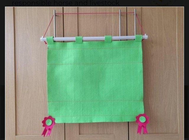 Preview of the first image of Green Felt Hanging Rosette Holder.