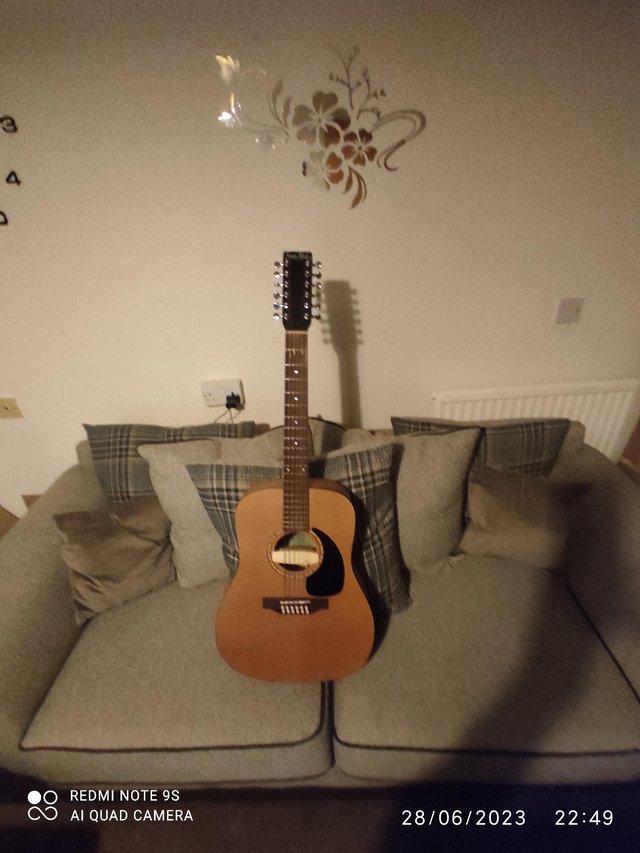 Preview of the first image of Simon and Patrick electro acoustic 12 string..