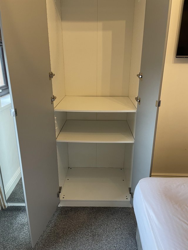 Preview of the first image of IKEA pax wardrobe 75cm with internal items.