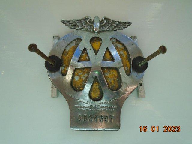 Preview of the first image of Vintage AA car badge 1945 - 1957 with original fittings.