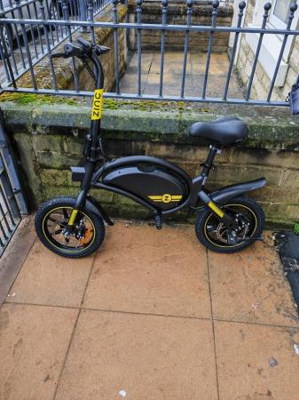 Image 3 of Electric scooter that looks like a bike