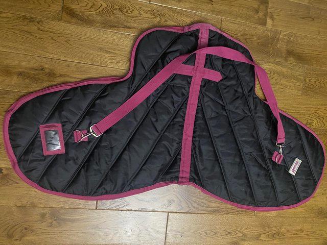 Preview of the first image of Dressage saddle protective padded nylon cover/bag.