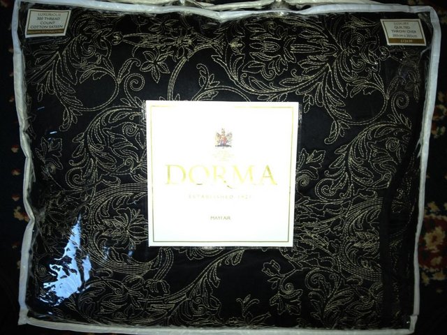 Preview of the first image of Dorma Superking-sized quilted bedspread.