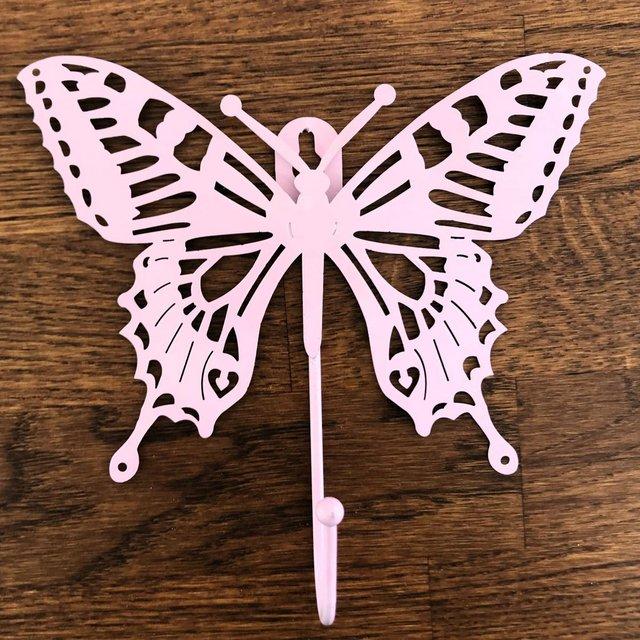 Preview of the first image of Pale pink metal butterfly door/wall coat/clothes hook..