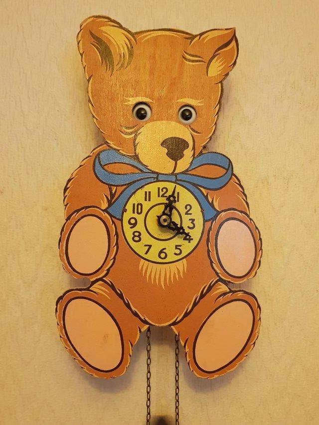 Preview of the first image of Vintage teddy bear clock weight driven moving eyes.