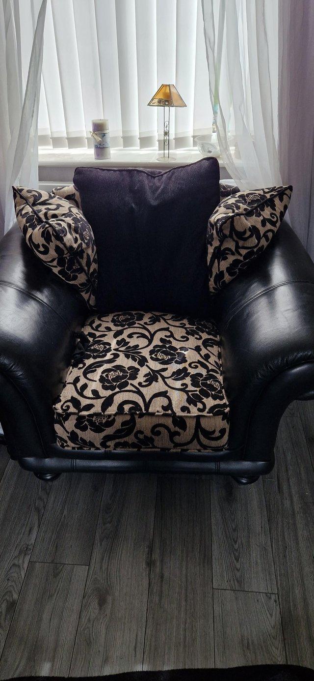 Preview of the first image of Leather armchair with washable seat and back cushions.