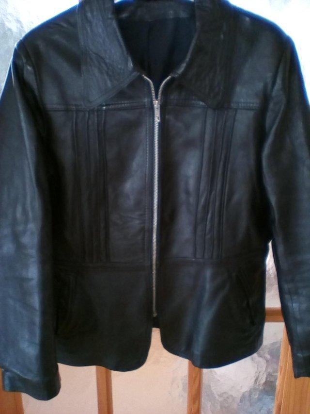 Preview of the first image of BLACK REAL LEATHER JACKET 12/14 – Pre-owned.