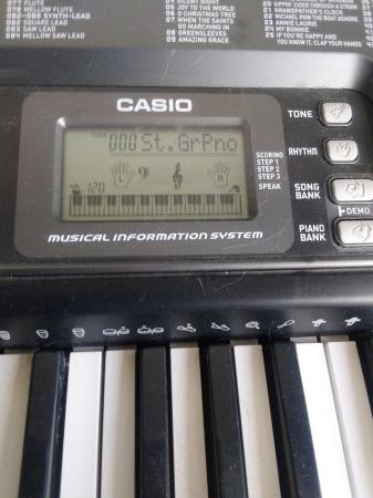 Image 1 of Casio keyboard and stand