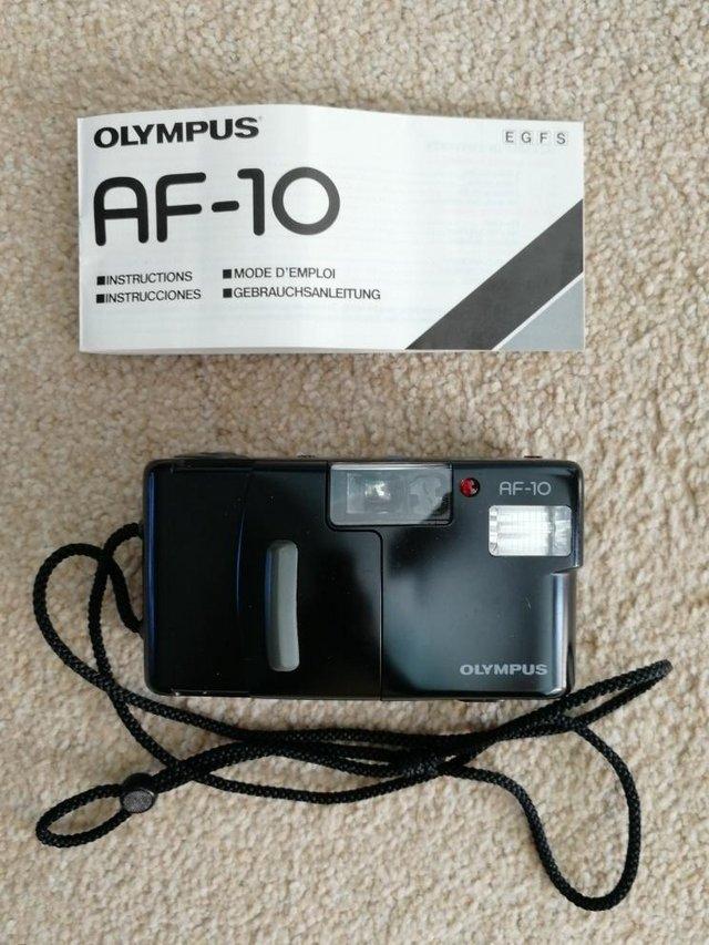 Preview of the first image of Olympus AF-10 35mm Camera “Point & Shoot”.