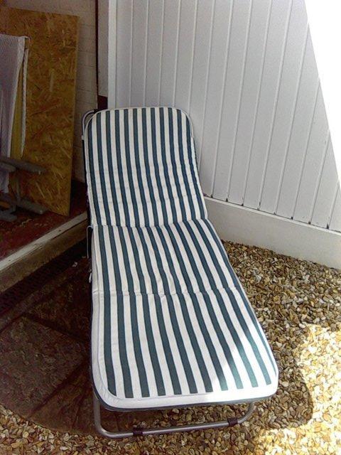 Preview of the first image of For sale four foldable sun loungers.