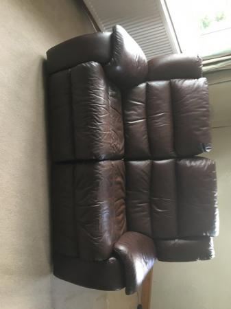 Image 1 of Brown Leather sofa powered