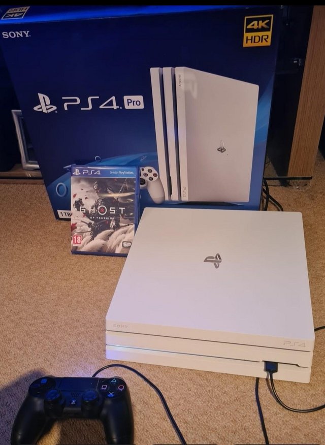 Preview of the first image of PlayStation 4 Pro 1TB  Games Console , 1 Game & Headphones.