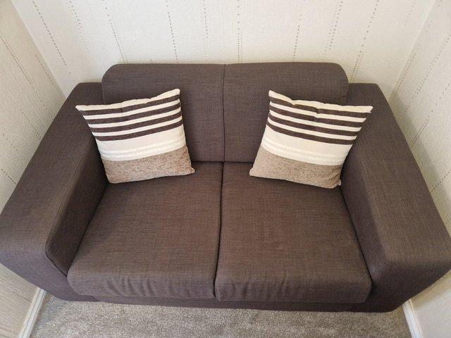 Preview of the first image of 2 Seater brown sofa Argos.