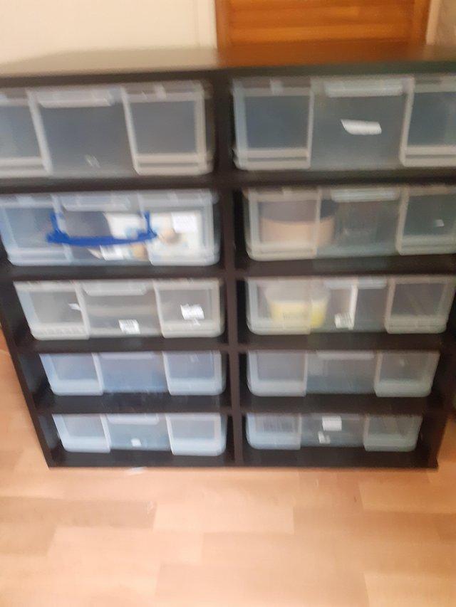 Preview of the first image of 33l useful boxes rack with 10 spaces.